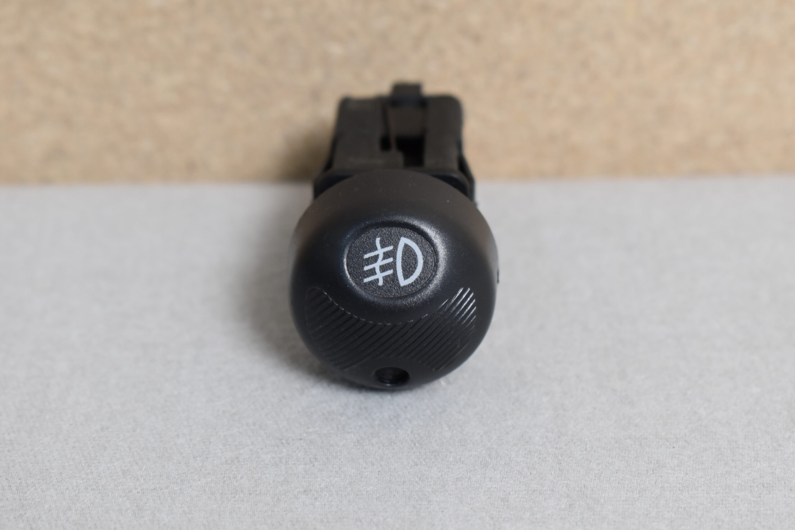 Lancia Schalter rund Nebelscheinwerfer