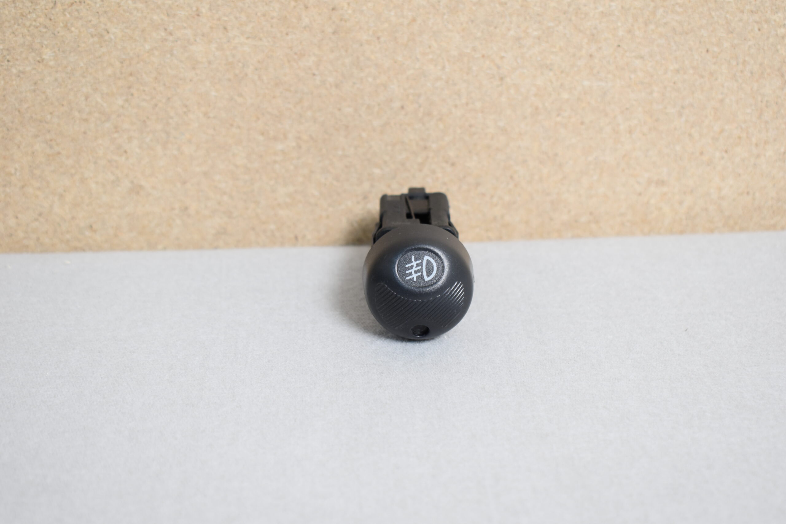 Lancia Schalter rund Nebelscheinwerfer