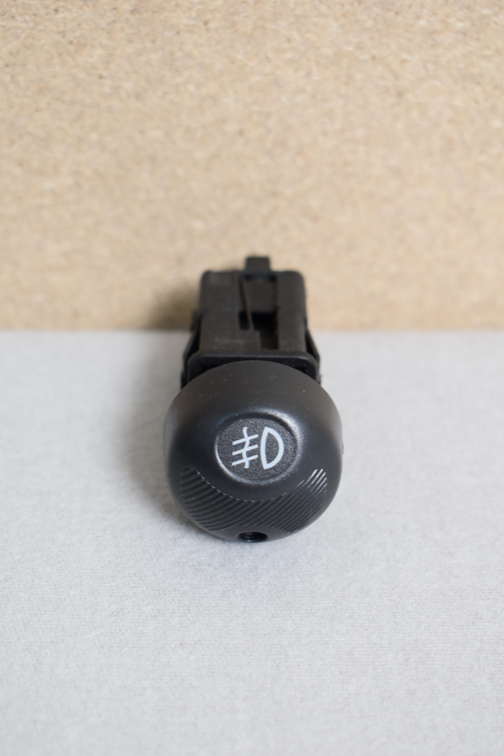 Lancia Schalter rund Nebelscheinwerfer