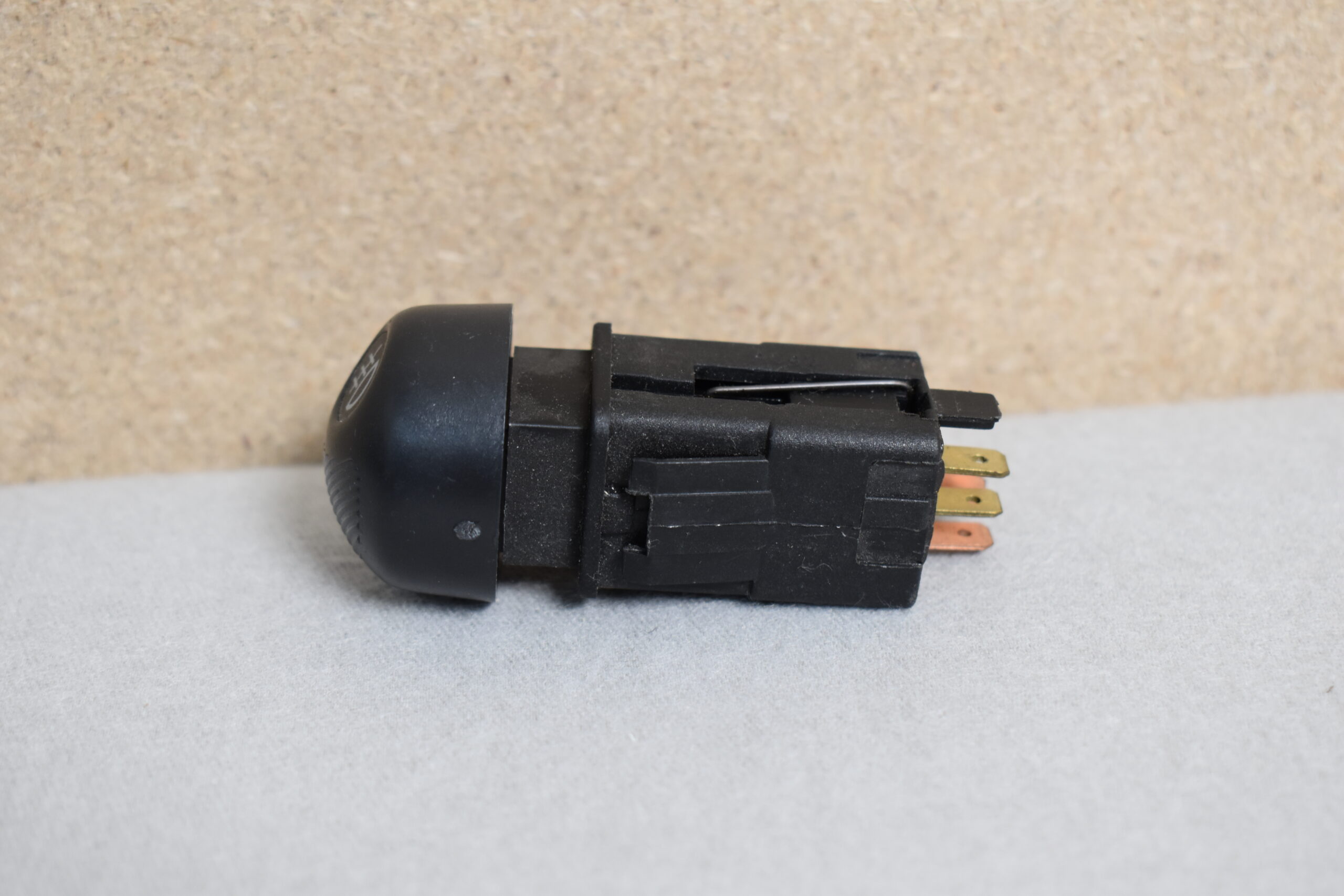 Lancia Schalter rund Nebelscheinwerfer